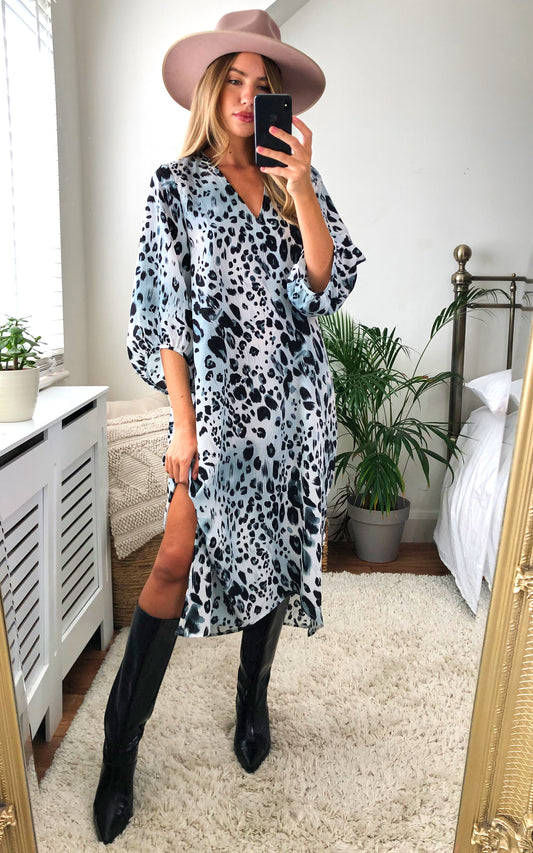 Loose fitting tunic dress with plunge neck and side split
