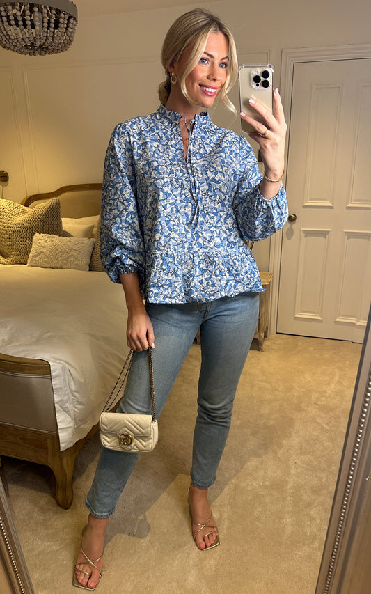 Floral print top with high neck and long sleeves in blue