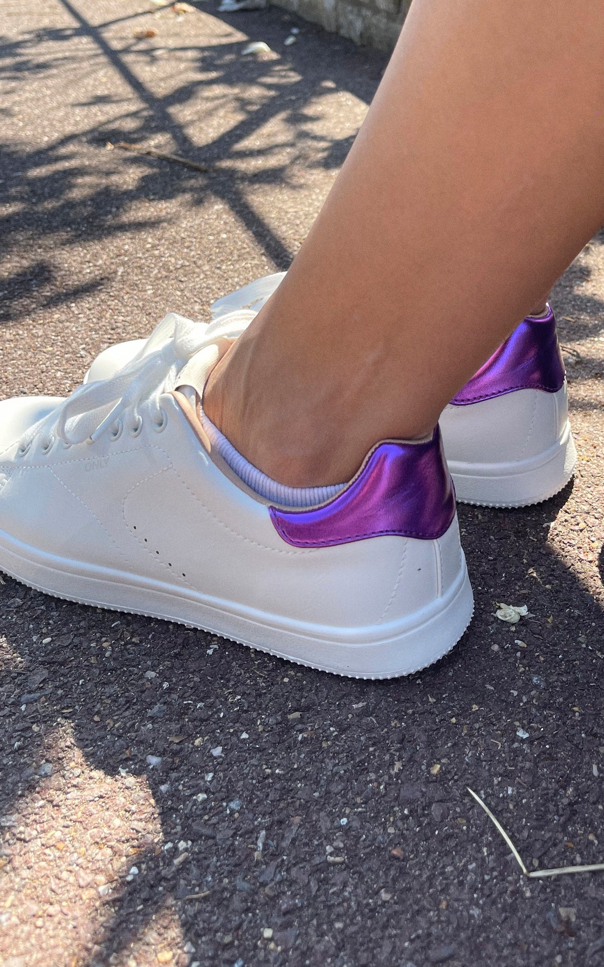 White Trainers with Metallic Purple Back