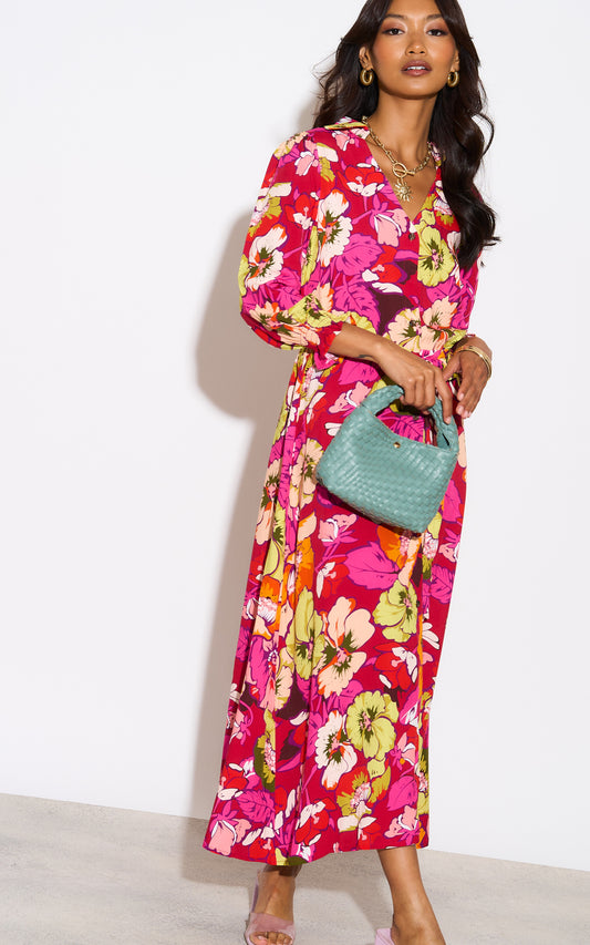 Large yellow and orange floral print shirt dress