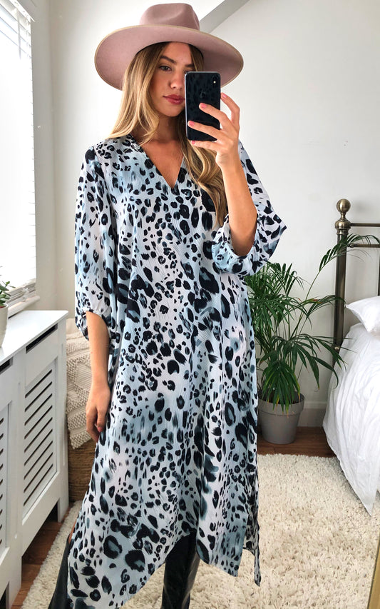 Loose fitting tunic dress with plunge neck and side split