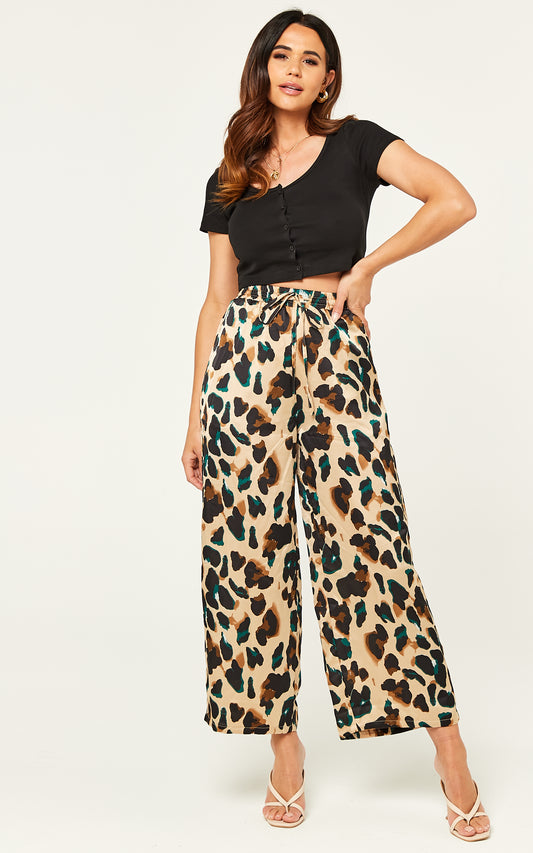 Satin leopard print wide leg trousers with elastics waist band and pockets in green