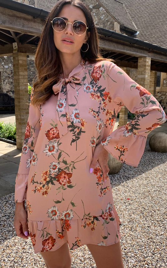 Blush floral long sleeve dress with tie bow and frill detail