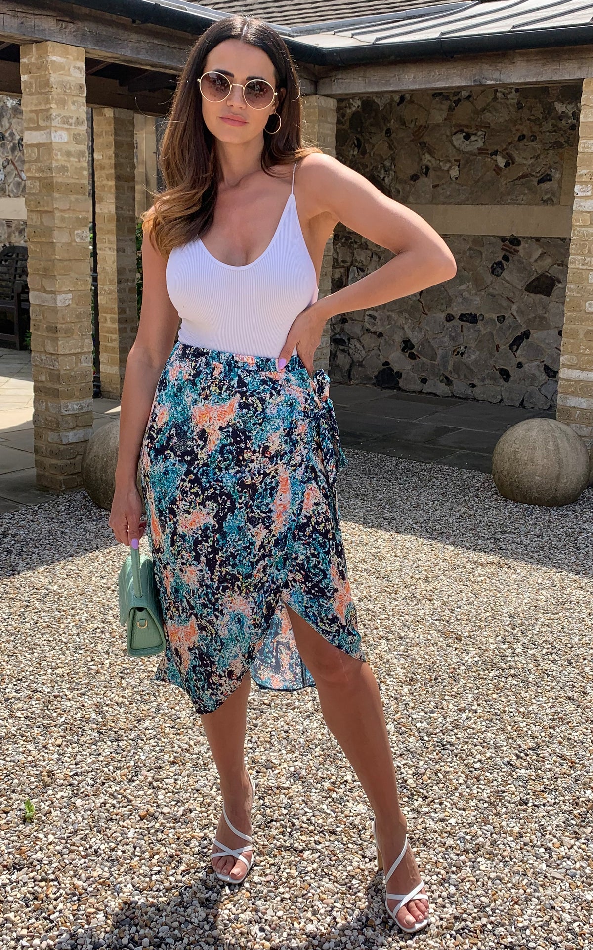Teal and orange multi color print wrap style skirt