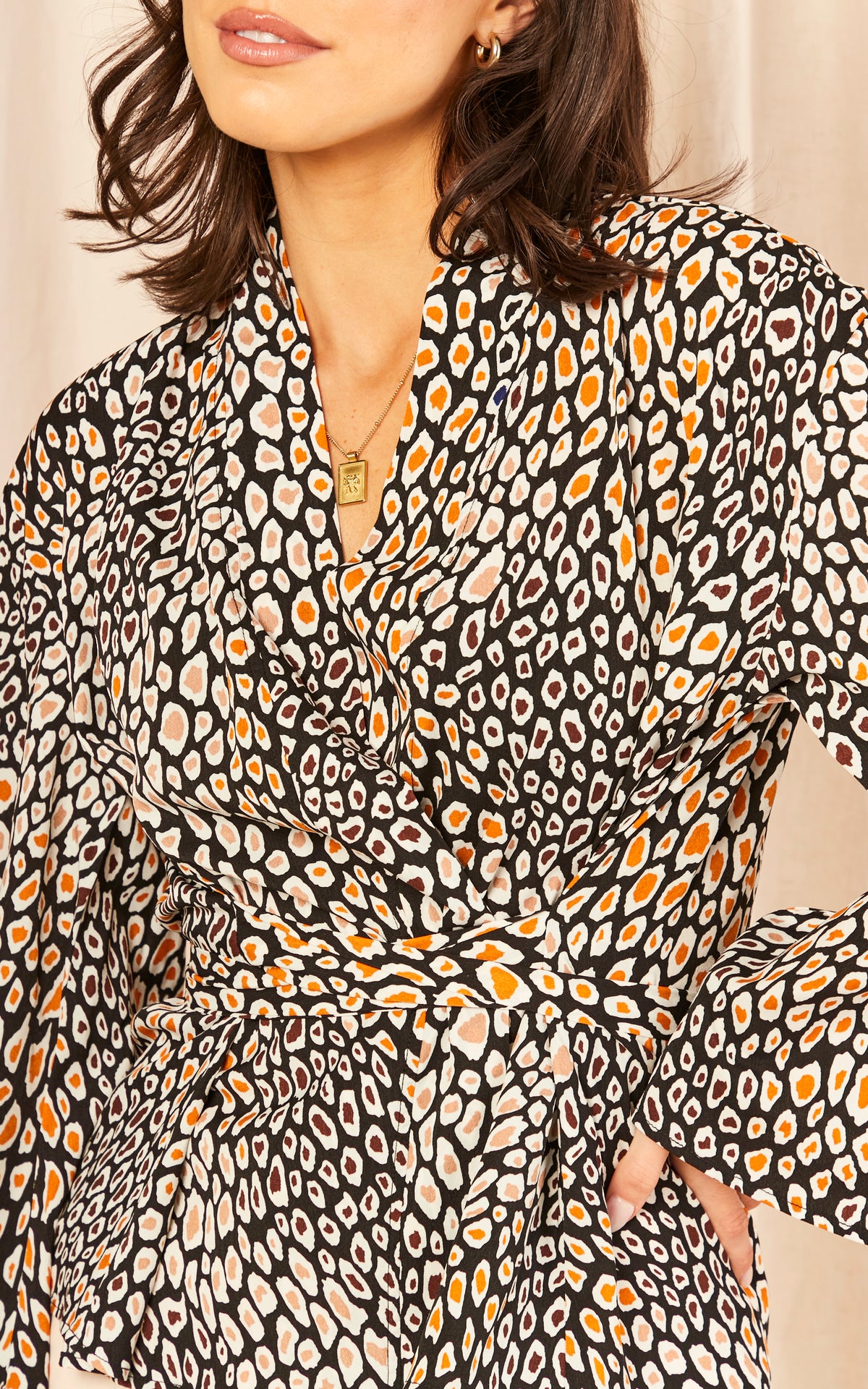 Leopard print long sleeve wrap top