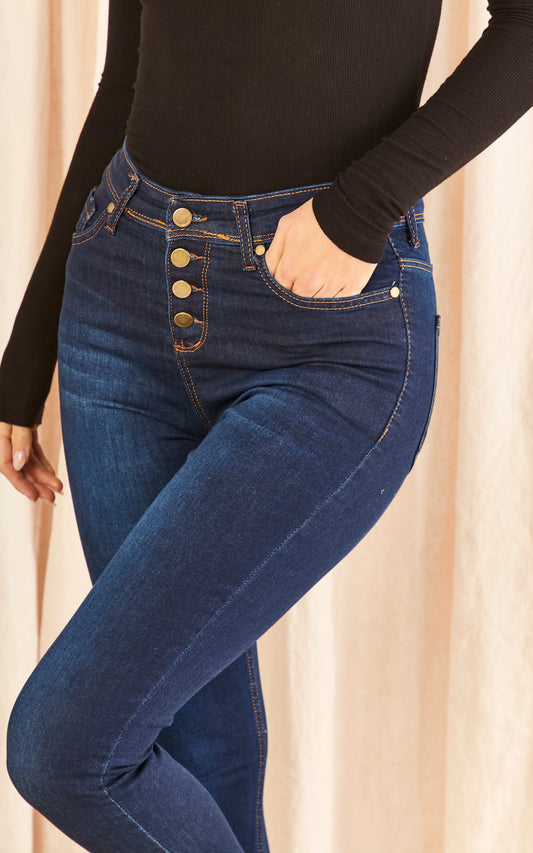 Dark blue ankle grazer skinny jeans with button detailing