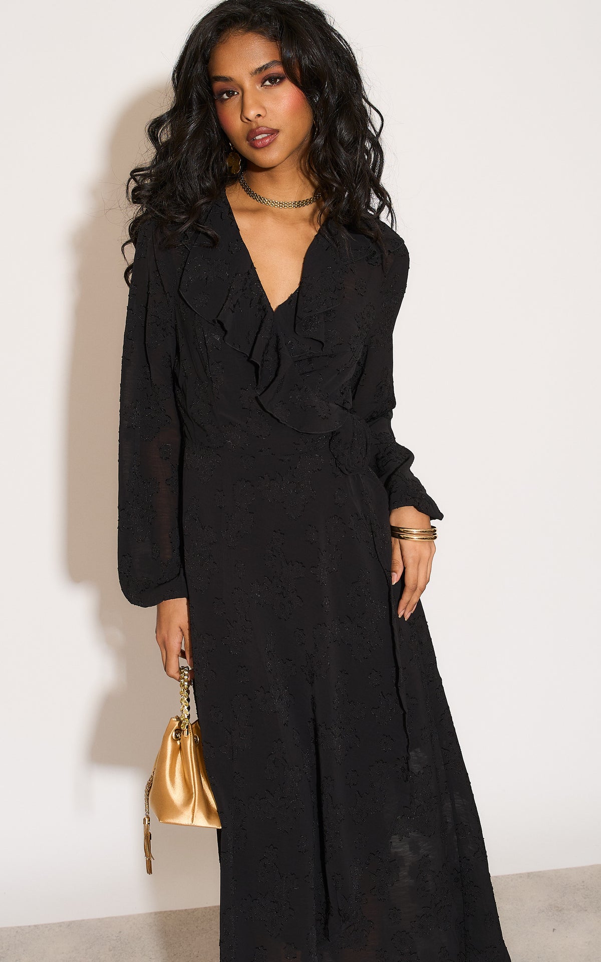 Ruffle wrap midi dress with blouson sleeve and rosette detail in black