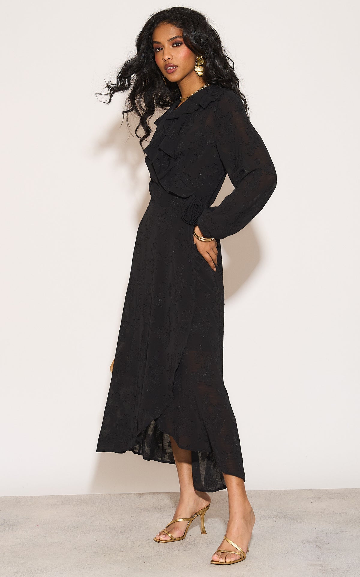 Ruffle wrap midi dress with blouson sleeve and rosette detail in black