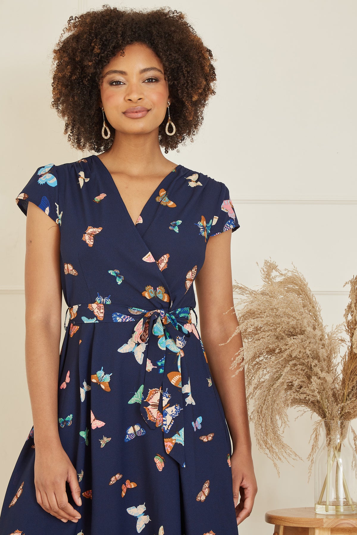 Navy Butterfly Print Dip Hem Midi Wrap Dress